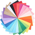 Bunte Seidenpapier-Bögen in verschiedenen Farben fächerförmig angeordnet.