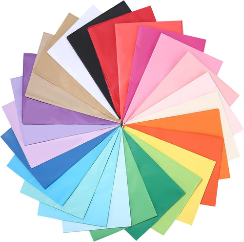 Bunte Seidenpapier-Bögen in verschiedenen Farben fächerförmig angeordnet.