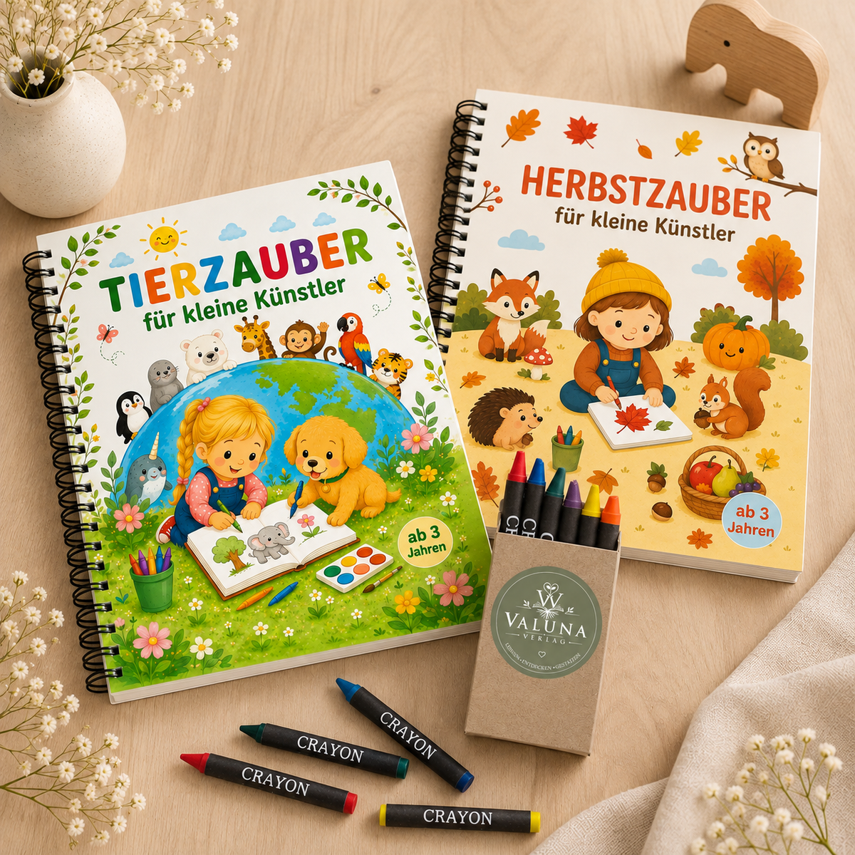 Bundle mit den Malbüchern Tierzauber und Herbstzauber sowie Wachsmalkreiden von VALUNA Verlag.